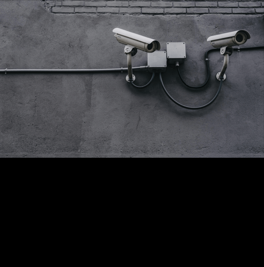 General Safety - image of security cameras on a building