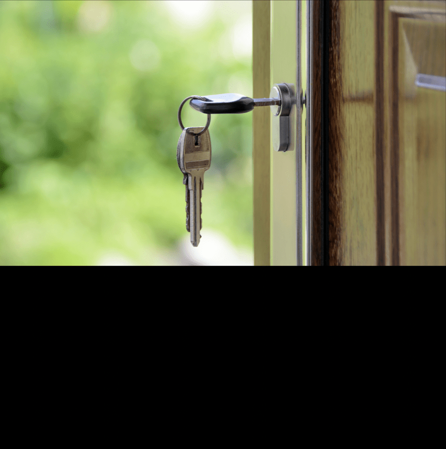 Home Safety - image of a key in a door lock