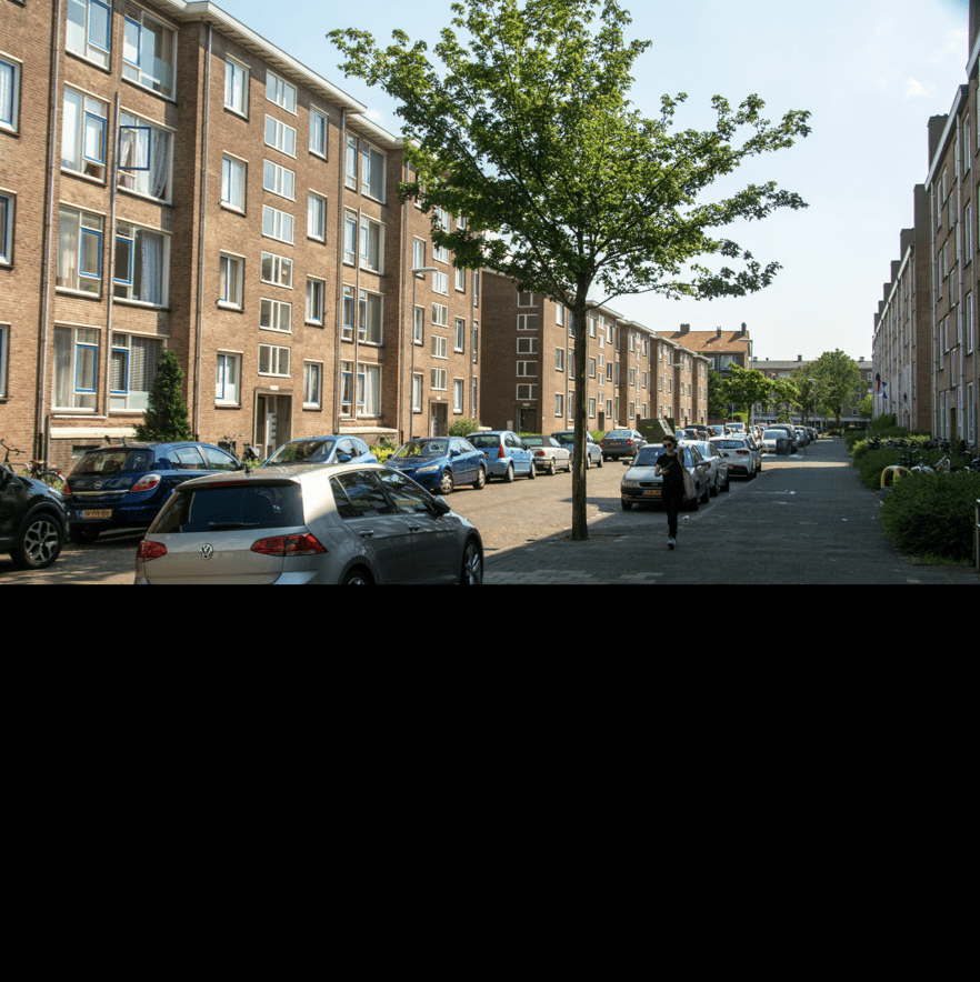 Car safety - image of a street with parked cars and sidewalk