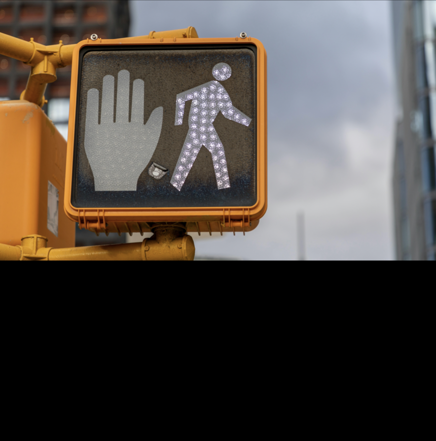 Walking Safety - image of a crosswalk sign